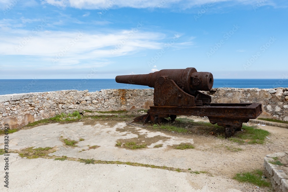 Cannon near rampart of Castillo de los Tres Reyes del Morro castle in Havana, Cuba