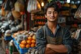 Portrait of an Asian small business owner looking at the camera. He has positive and confident look.