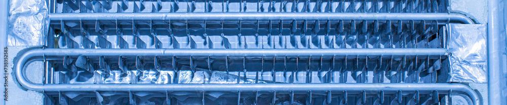 Fototapeta premium close-up of the insides of a home refrigerator during cleaning and repair service at an official diagnostic center
