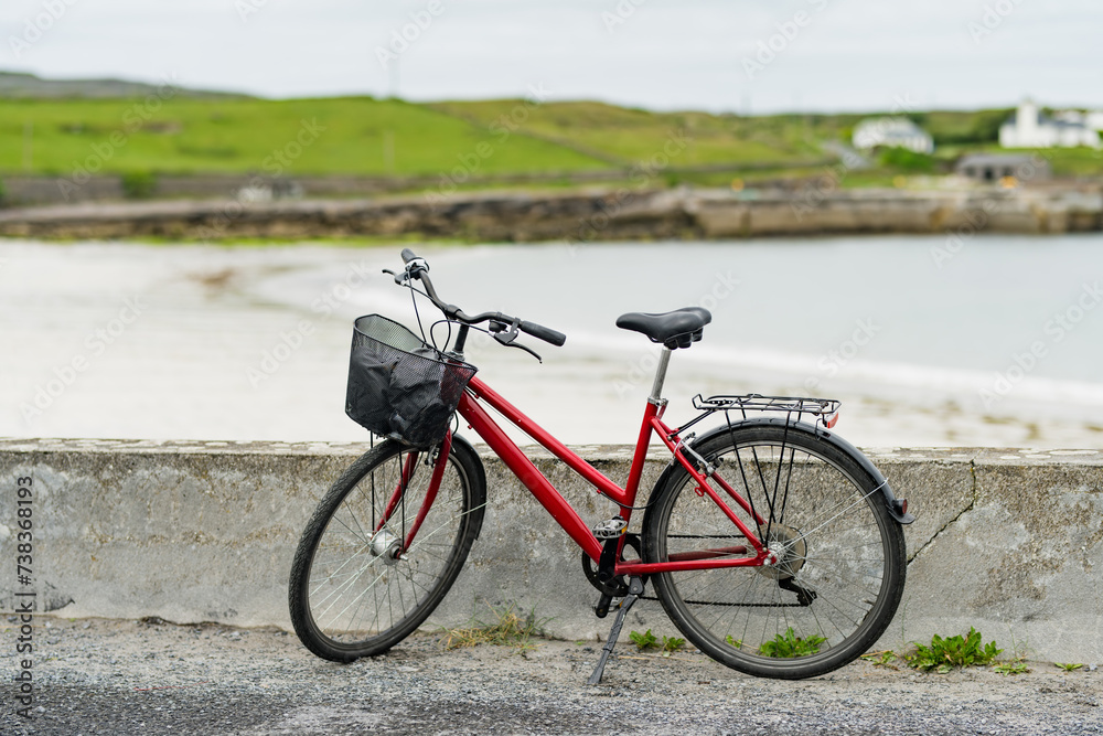 Bike parked on Inishmore, the largest of the Aran Islands in Galway Bay. Renting a bicycle is one of the most popular way to get around Inis Mor, Ireland.