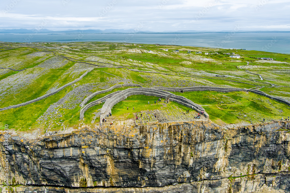 Dun Aonghasa or Dun Aengus, the largest prehistoric stone fort of the Aran Islands, popular tourist attraction, important archaeological site, Inishmore island, Ireland - obrazy, fototapety, plakaty 