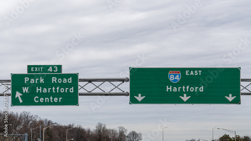 signs on Interstate 84 in West Hartford, Connecticut for exit 43 to Park Road and West Hartford Center and continuing on I-84 to Hartford photo