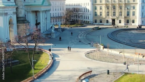 Square in front of Karlskirche cathedral, people photo