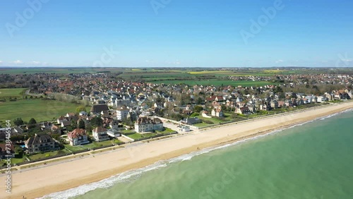 The village on the beach of Sword Beach in Europe, France, Normandy, towards Ouistreham, Hermanville, in spring, on a sunny day. photo