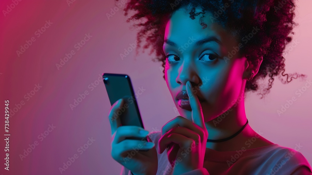 Photo of pretty ethnic woman ponders on how to answer question thinks deeply about something uses modern mobile phone tries to made up good message keeps index finger near lips stands  : Generative AI - obrazy, fototapety, plakaty 