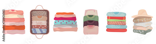 Set of stacked clothes on white background