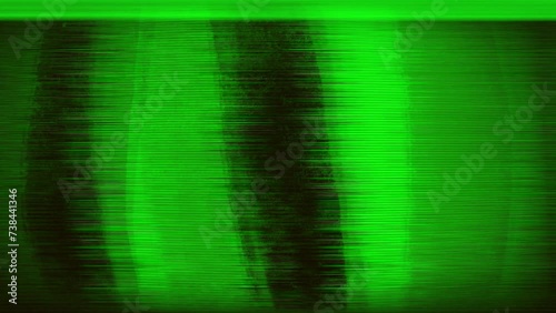 Green background with fast moving images television static and distorted drawings and glitch effects photo