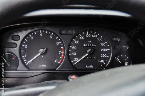Car Dashboard Speedometer and Tachometer Close-up