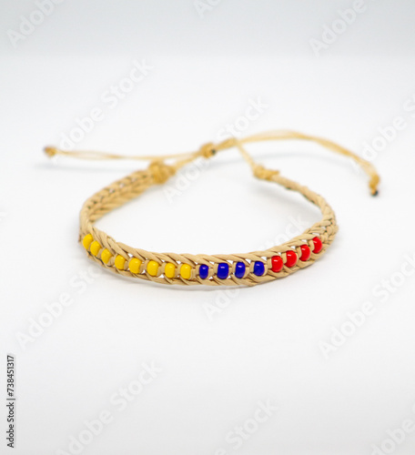artisan handle with the colors of the Colombian flag