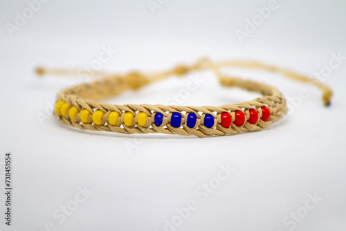 artisan handle with the colors of the Colombian flag