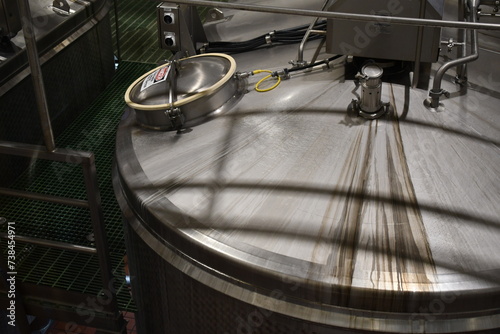Canvastavla Top of stainless steel storage tank in factory.