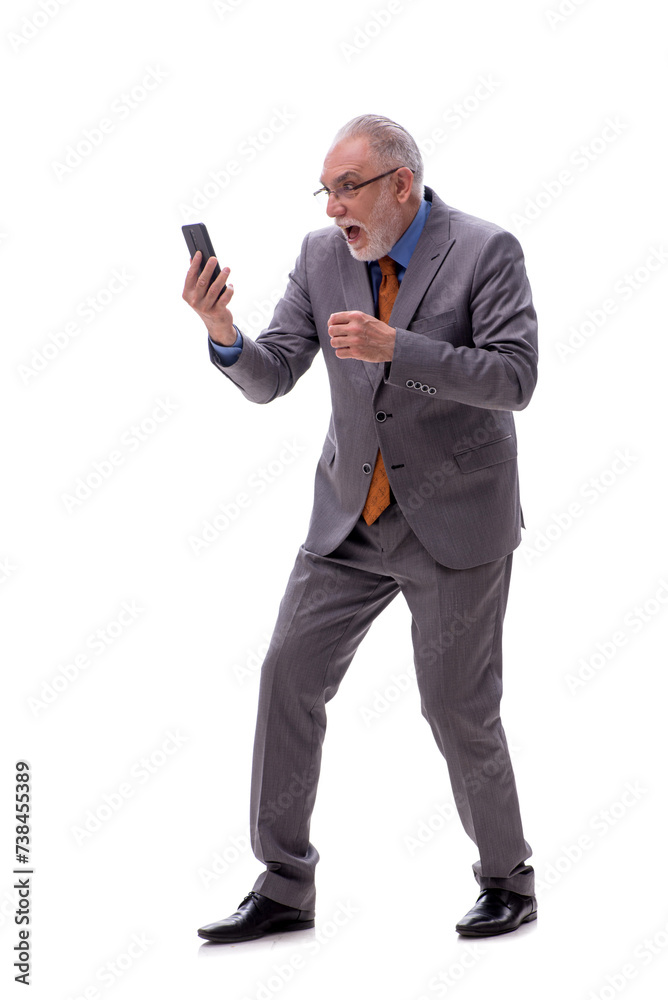 Old businessman talking by phone isolated on white Old businessman talking by phone isolated on white