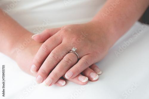 A wedding ring is a finger ring typically worn on the base of the left ring finger, indicates that its wearer is married, usually forged from metal, traditionally gold or another precious metal