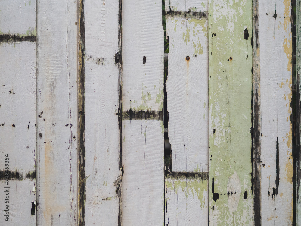 Vintage Wood Ensemble: A picturesque scene featuring an aged wooden door, wall, and fence, showcasing rustic textures and weathered charm