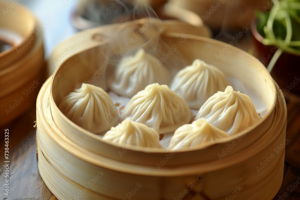 Xiao Long Bao Chinese food, delicious food ready to eat in a bowl Xiao Long Bao Chinese food, delicious food ready to eat in a bowl