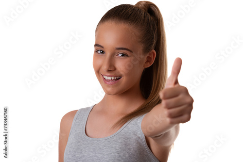 Close up portrait of happy smiling beautiful young teen girl showing thumbs up gesture, isolated on white background