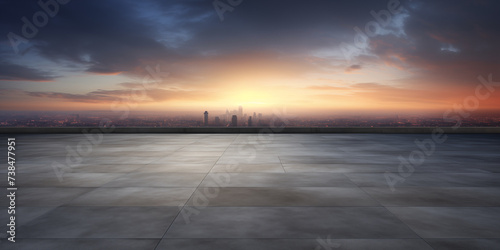 Dark concrete floor with picturesque night sky horizon, Evening light with dramatic clouds and the city.
 photo