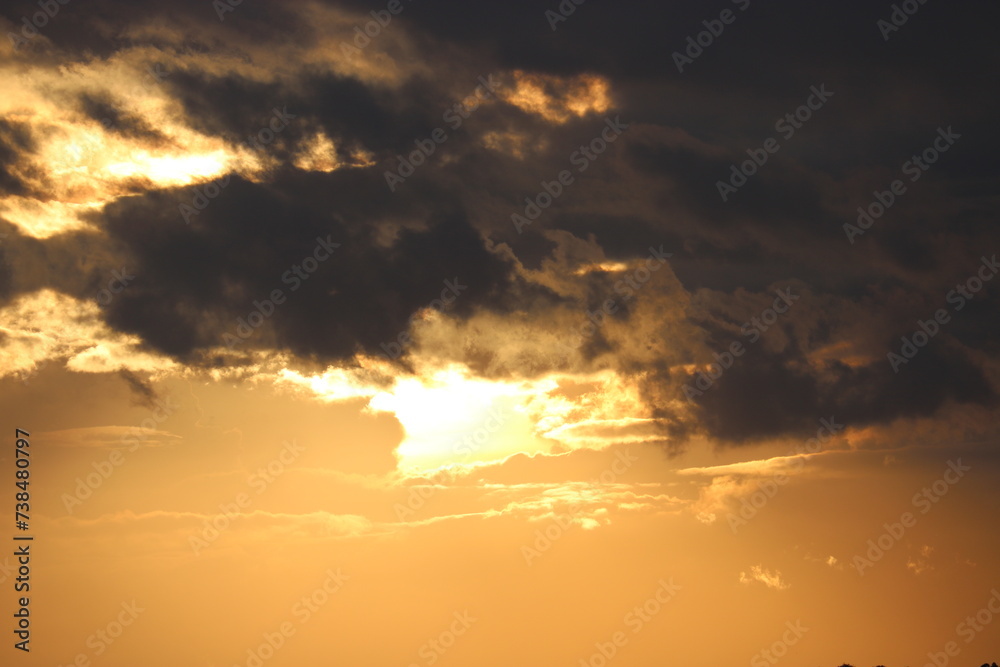 Dramatic sky at sunrise, natural background with cirrus and cumulus clouds