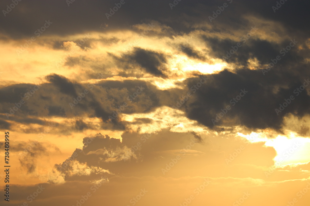 Dramatic sky at sunrise, natural background with cirrus and cumulus clouds