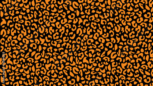 Leopard skin fur texture black and orange background 