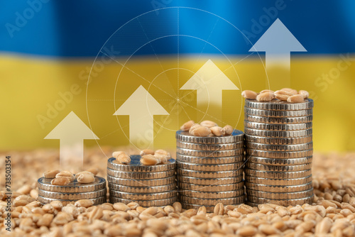 Growing money in the form of a stack of coins on the background of the Ukrainian flag and grain. Wheat price, grain reserves around the world. Food crisis. Export Logistics Solution