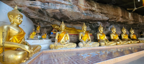 Golden buddha in the cave