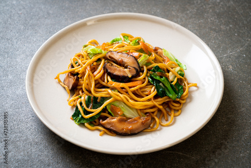 yakisoba noodles stir-fried with vegetable in asian style - vegan and vegetarian food