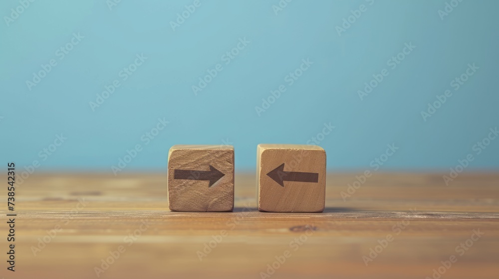 Wooden blocks are standing on a table, with two arrows inside, featuring minimalist grids in sky-blue hues, utilizing minimal retouching. Wooden blocks are standing on a table, with two arrows inside, featuring minimalist grids in sky-blue hues, utilizing minimal retouching.