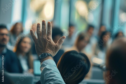 Unrecognizable businessman person of multi-ethnic businesspeople raising their hands during a presentation seminar for asking question at their company photo