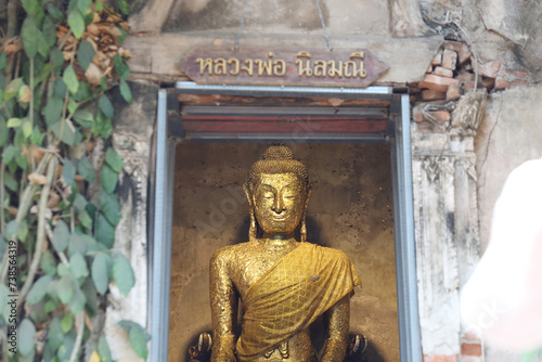 Buddha statue in old church at Wat Bang Kung, Amphawa distinct in Samut Songkhram province Thailand. photo