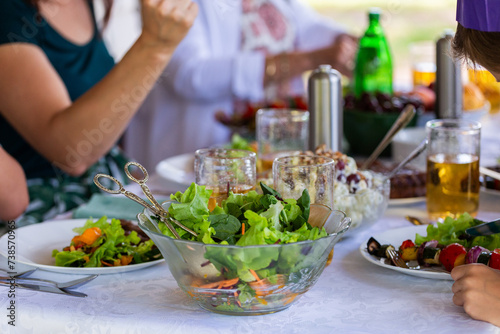 Fresh mango salad at Christmas lunch meal table with family