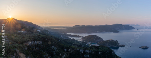 Obraz na płótnie Aerial sunrise view of the bay of Palaiokastritsa on the island of Corfu w salonie