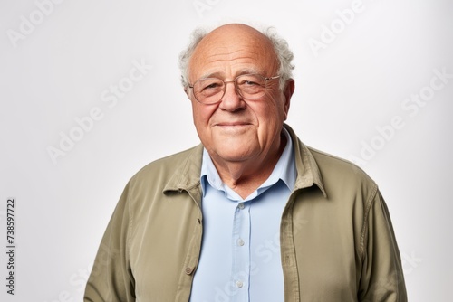 Portrait of a senior man with grey hair and glasses. Isolated on white background.