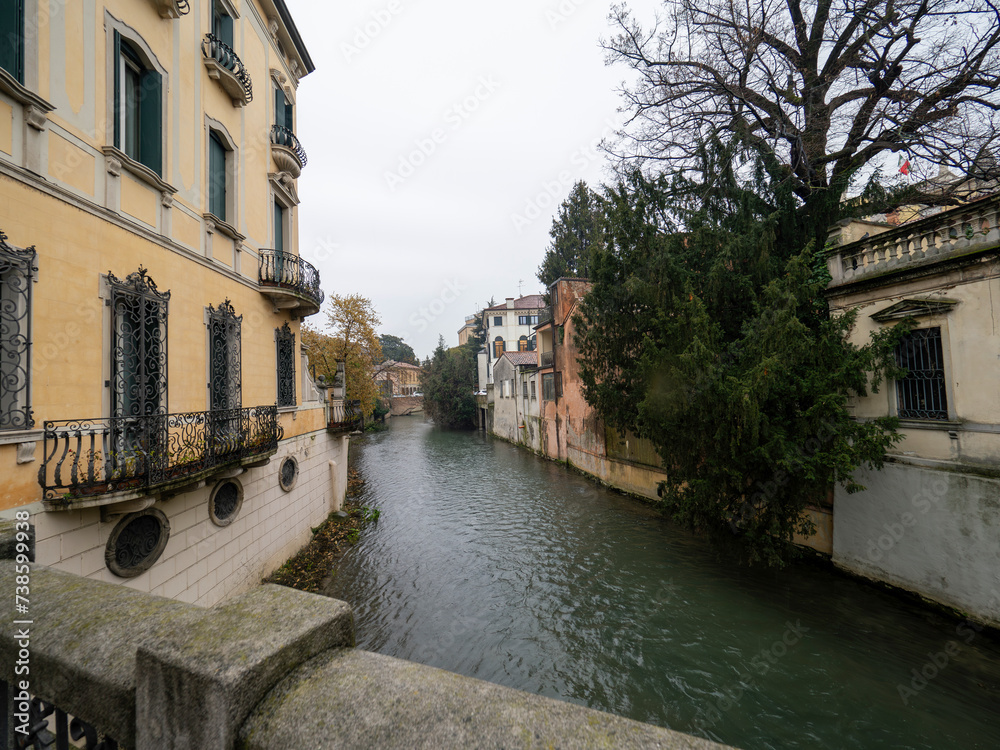 Beautiful canal along the street in Padua