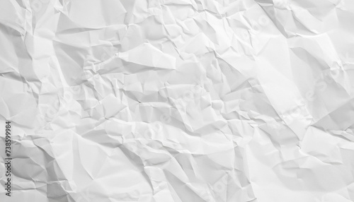 Abstract white paper wrinkled or crumpled texture background, top view, flat lay.