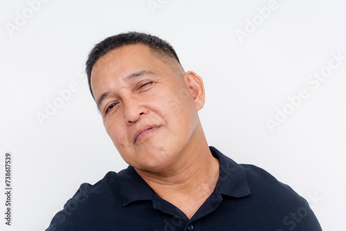 Εκτύπωση καμβά A portrait of a middle-aged Asian man showing skepticism, isolated on a white background, with a doubtful look, seeing through someone's bluff