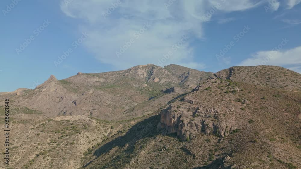 The Cabezón de Oro (in Valencian, Cabeçó d'Or) is a mountain range located in the province of Alicante,. It belongs to the municipalities of Jijona, Relleu and Busot, Alicante, Spain - stock video The Cabezón de Oro (in Valencian, Cabeçó d'Or) is a mountain range located in the province of Alicante,. It belongs to the municipalities of Jijona, Relleu and Busot, Alicante, Spain - stock video