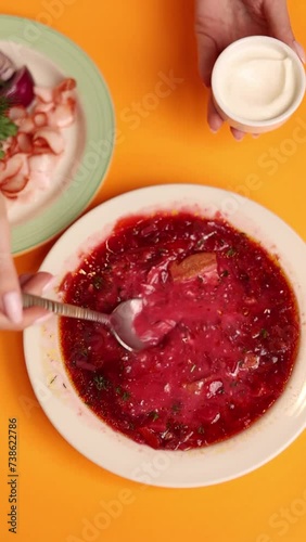 Wallpaper Mural A plate of Ukrainian borsch on an orange background Torontodigital.ca