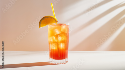 Tequila sunrise with lemon on a white background