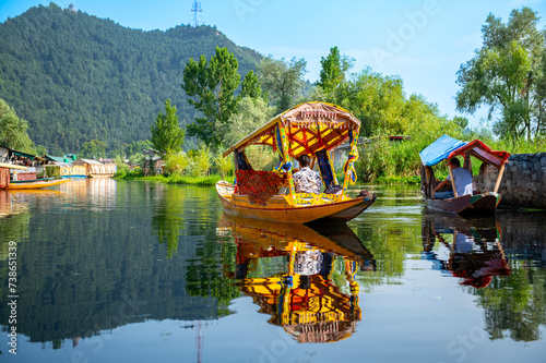 Dal Lake and the beautiful mountain range in the background in the summer Boat Trip of city Srinagar Kashmir India.	