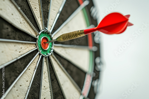Strategic, Perfection and Success, Goals business and achievement concept. Dart board has red dart arrow throw hitting the center of a shooting.