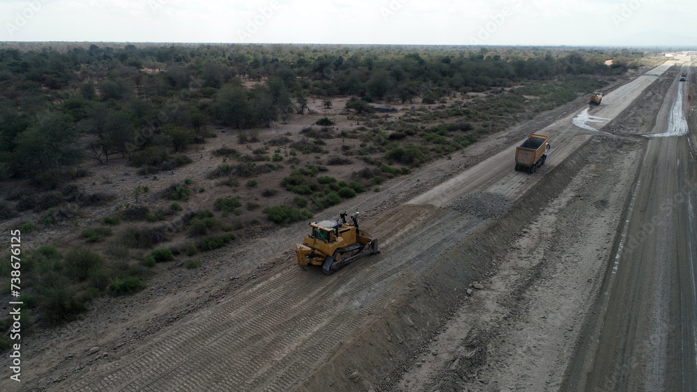 construction machines at works, dozer, roller machine, excavator, crawler rock drill machine, trucks, GPS grader construction machines at works, dozer, roller machine, excavator, crawler rock drill machine, trucks, GPS grader