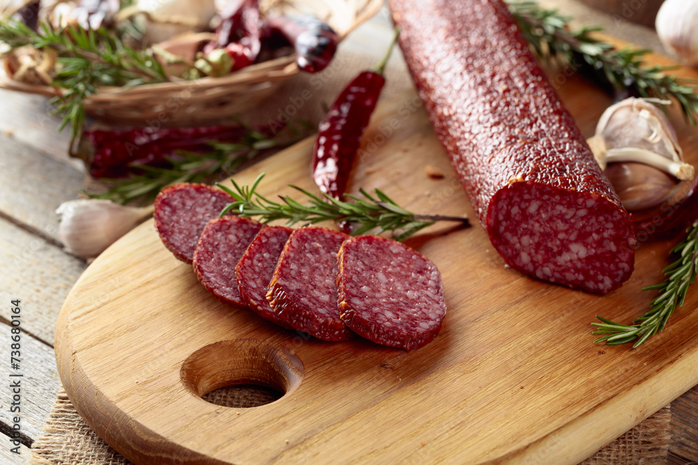 Salami on a cutting board.