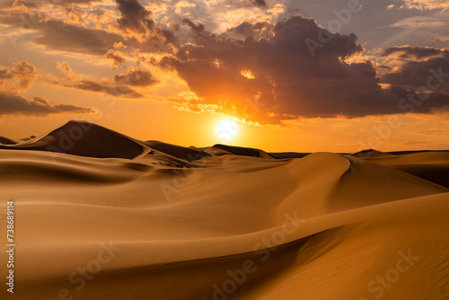Sunset over the sand dunes in the desert. Rub' al Khali desert photo