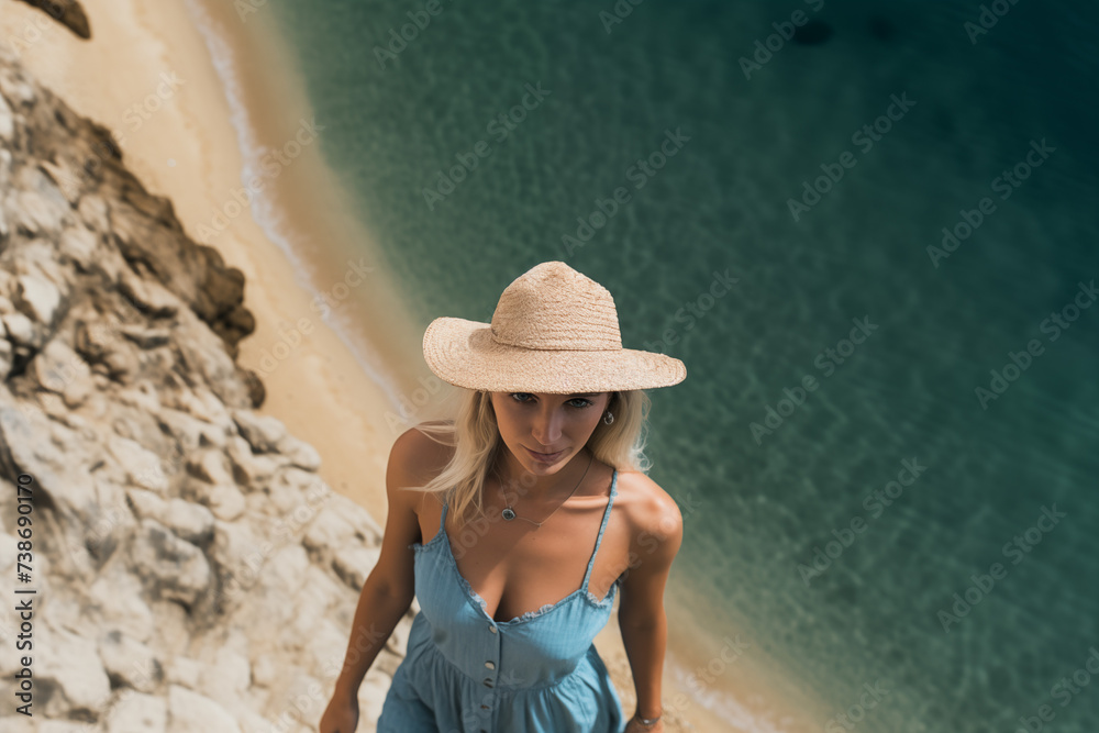 Beautiful young woman on the beach sunny day young woman in beach hat Beautiful young woman on the beach sunny day young woman in beach hat
