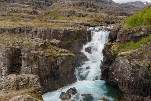 The waterfall Nykurhylsfoss, also known as Sveinsstekksfoss, in southeast Iceland photo