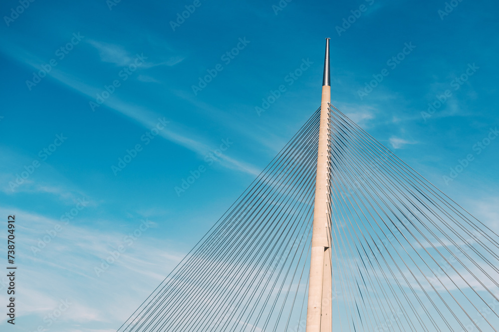 suspension wires reaching high into the sky, the metal bridge in Belgrade, Serbia, stands tall as a symbol of transportation ingenuity suspension wires reaching high into the sky, the metal bridge in Belgrade, Serbia, stands tall as a symbol of transportation ingenuity