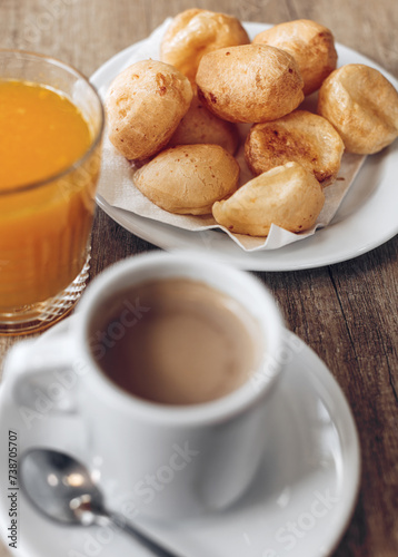 P  o de queijo or Brazilian cheese bread  a small  baked cheese roll or cheese bun  a popular snack and breakfast food in Brazil.