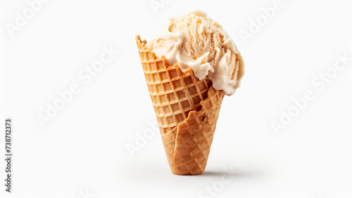 An isolated hand holding ice cream in a waffle cone against a backdrop of pure white