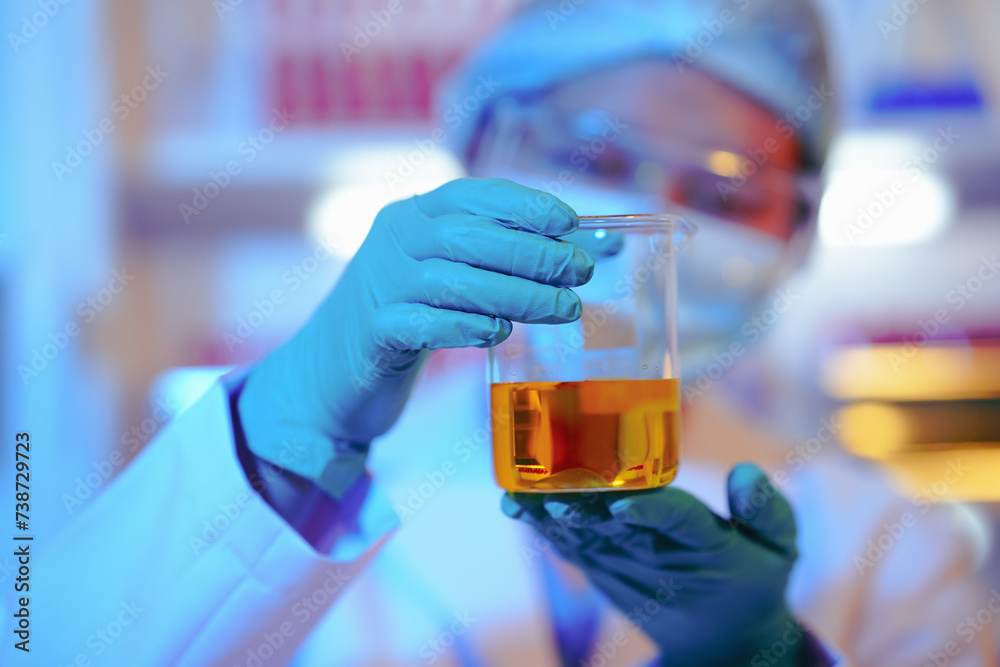 Asian female scientist passionately conducts experiments in a laboratory, surrounded by petri dishes and beakers. Delve into the chemistry of gasoline, food ingredients, and perfumes Asian female scientist passionately conducts experiments in a laboratory, surrounded by petri dishes and beakers. Delve into the chemistry of gasoline, food ingredients, and perfumes